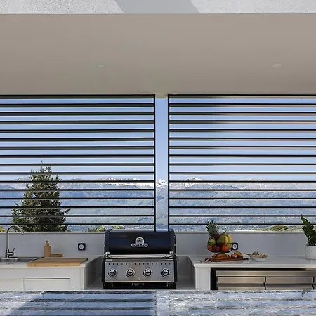 Villa Versante Rousso - Modern Living In Nature's Embrace By Etouri Kaina